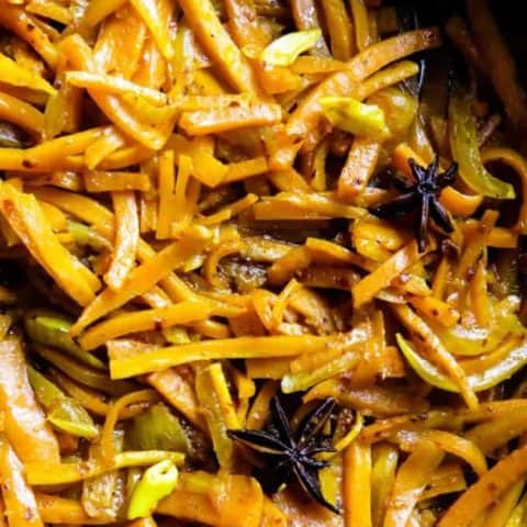 Pan-fried spicy carrots(Sri Lankan). Infused with star anise, this easy, gluten-free, vegan, vegetarian dish makes the perfect side dish for any meal. #carrots #stirfry #Srilankan