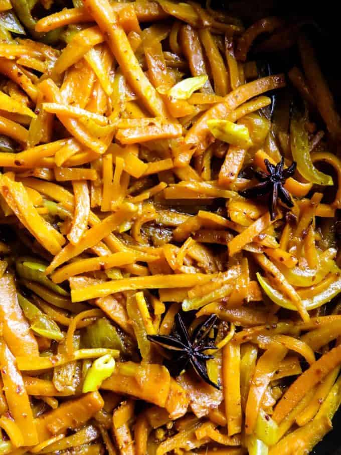 Pan-fried spicy carrots(Sri Lankan). Infused with star anise, this easy, gluten-free, vegan, vegetarian dish makes the perfect side dish for any meal. #carrots #stirfry #Srilankan