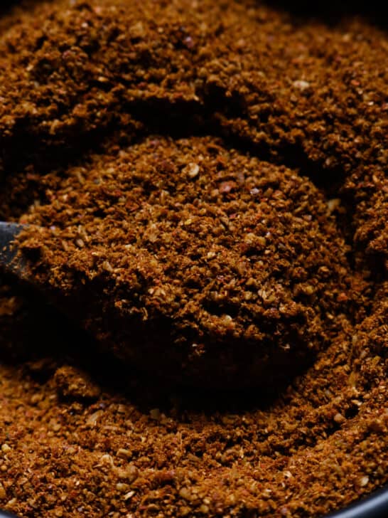 jaffna curry powder scooped with a spoon.