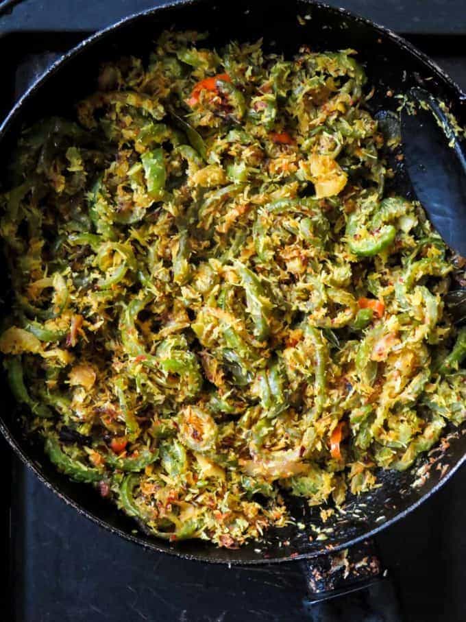 Sri Lankan snake gourd stir-fry(pathola mallung)-  Next time you pass by a farmers market or a vegetable stall pick up a snake gourd to make this easy vegan, vegetarian stir-fry.  