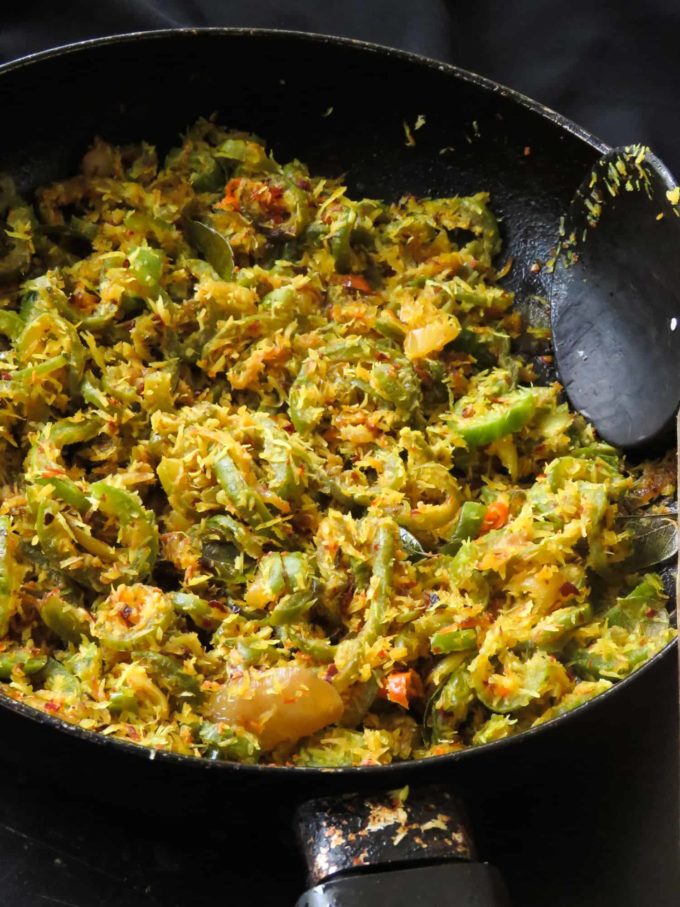 Sri Lankan snake gourd stir-fry(pathola mallung)-  Next time you pass by a farmers market or a vegetable stall pick up a snake gourd to make this easy vegan, vegetarian stir-fry.  