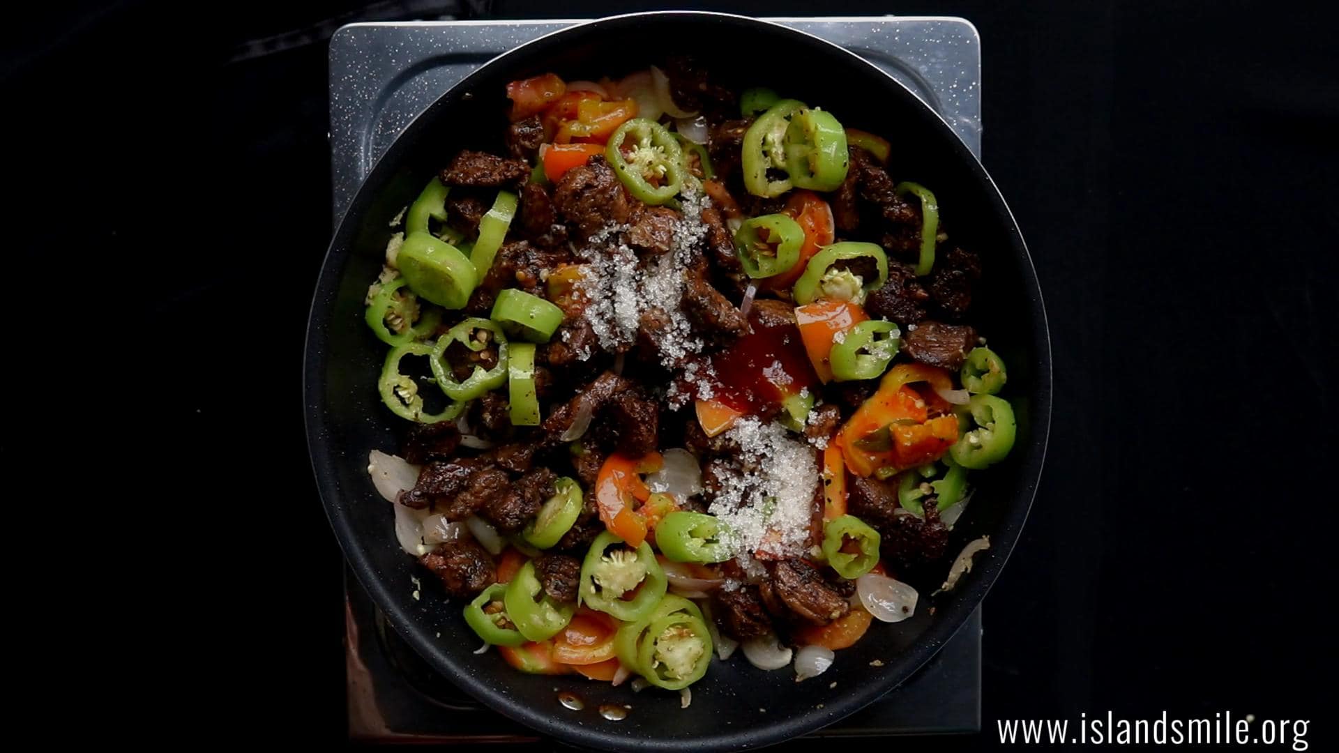 add the tomato sauce, sugar to the beef for devil beef.