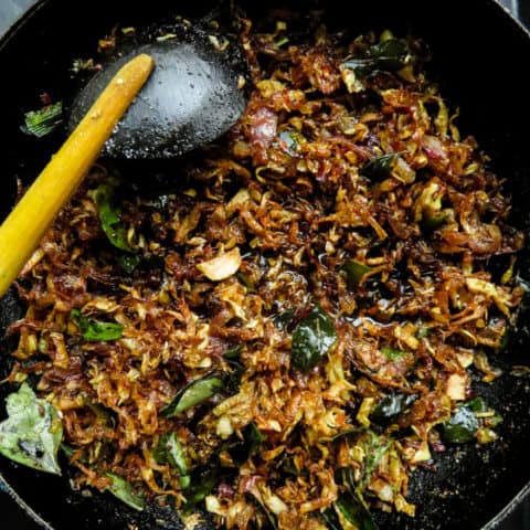 Also known as kesel muwa seeni sambol-a vegan/vegetarian delicacy you won't be able to resist. if you haven't made fried banana flower seeni sambol then you should try making this rice puller. #vegan #vegetaran #srilankan #fry #bananaflower #glutenfree.