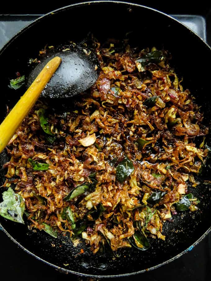 Also known as kesel muwa seeni sambol-a vegan/vegetarian delicacy you won't be able to resist. if you haven't made fried banana flower seeni sambol then you should try making this rice puller. #vegan #vegetaran #srilankan #fry #bananaflower #glutenfree.