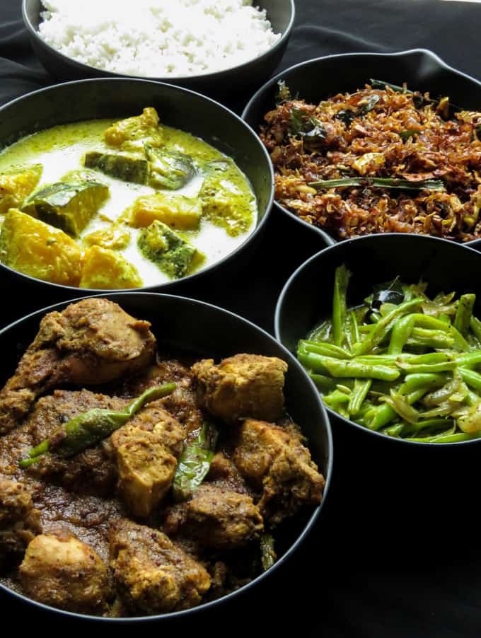A homemade meal plan to indulge yourself in traditional Sri Lankan food. Kalupol chicken curry, creamy pumpkin curry, bean curry and banana flower stir-fry. #SriLankan #mealplan #riceandcurry #lunch #menu #curry A homemade meal plan to indulge yourself in traditional Sri Lankan food. Kalupol chicken curry, creamy pumpkin curry, bean curry and banana flower stir-fry. #SriLankan #mealplan #riceandcurry #lunch #menu #curry