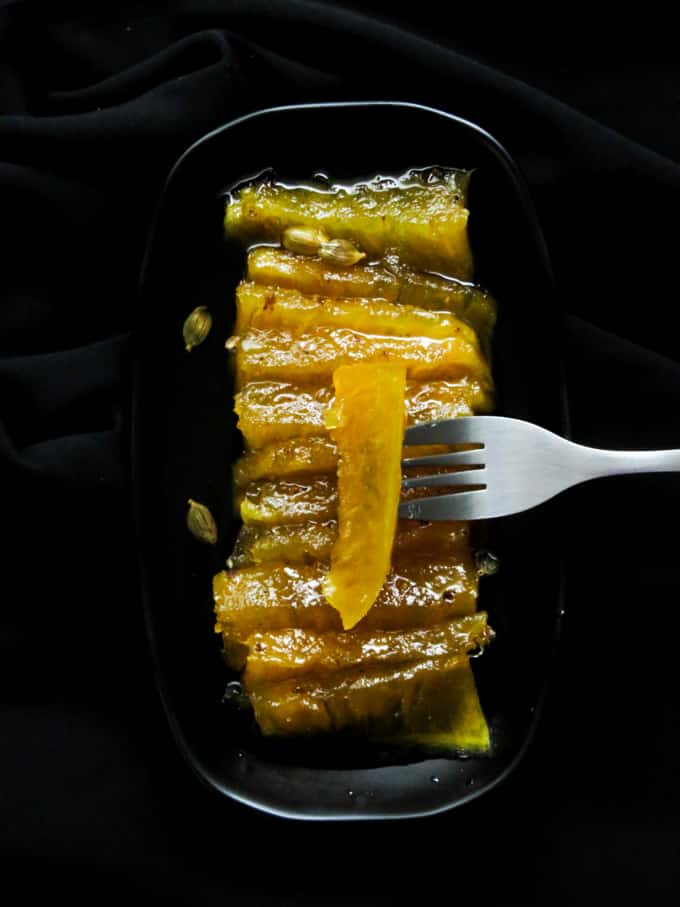 A well known Sri Lankan sweet served at weddings and Eid festival. Pineapple dosi is part candied fruit and preserved pineapple chunks in a sugary syrup. 