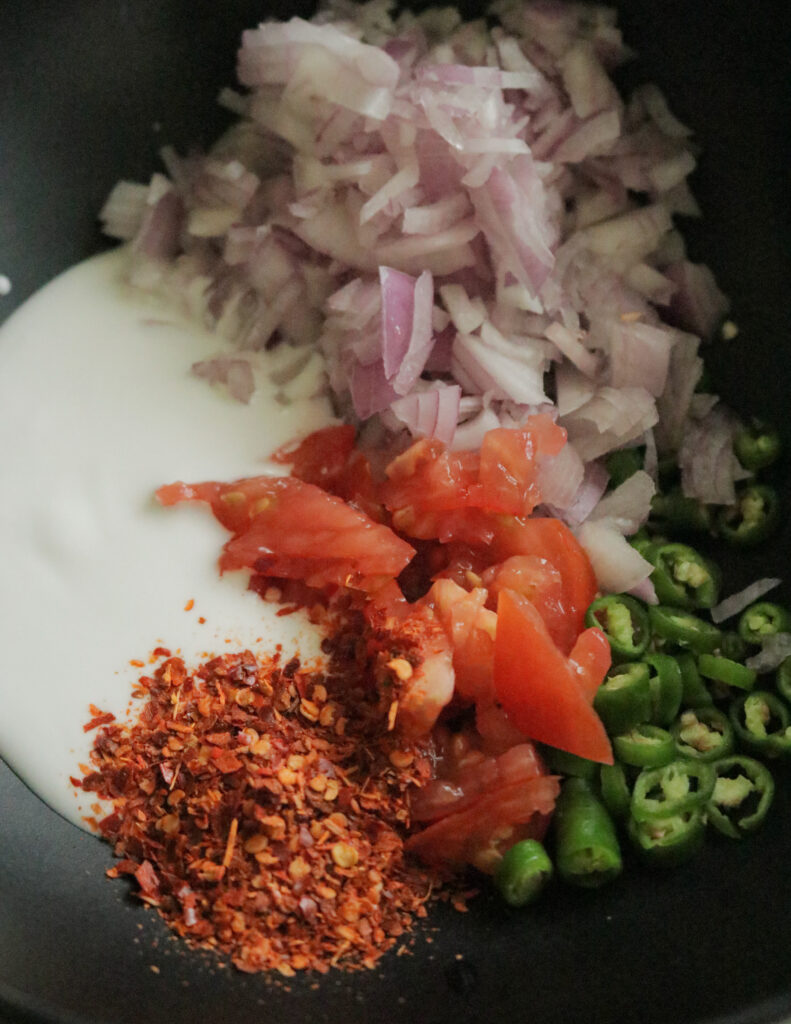 onions, tomatoes.coconut milk, green chillies to make omelette