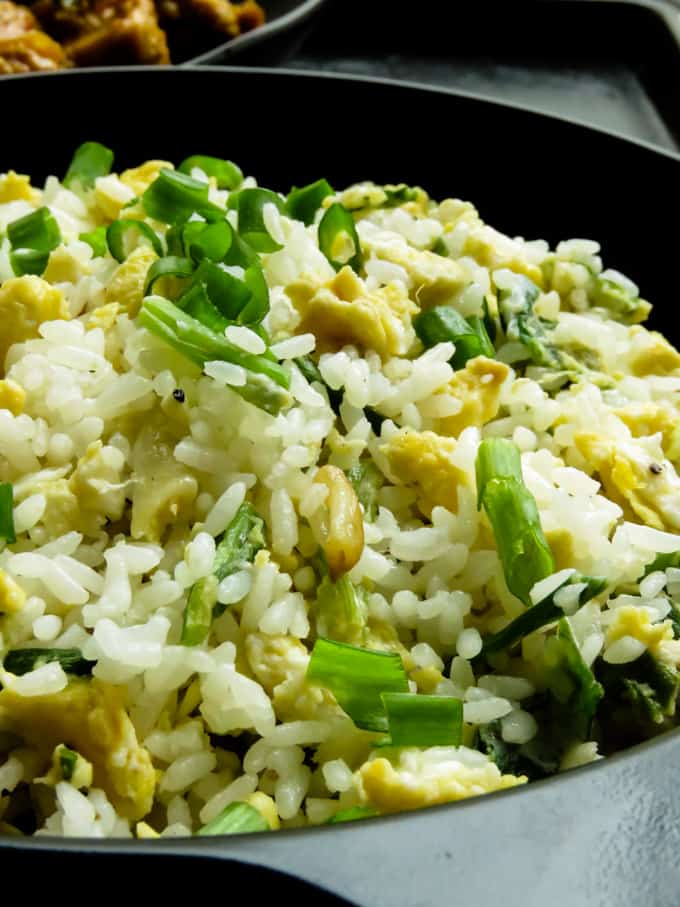 Make use of any leftover rice and make the easiest Garlic and egg fried rice in with less than 5 ingredients. it's a one-pot simple meal in 30 minutes.