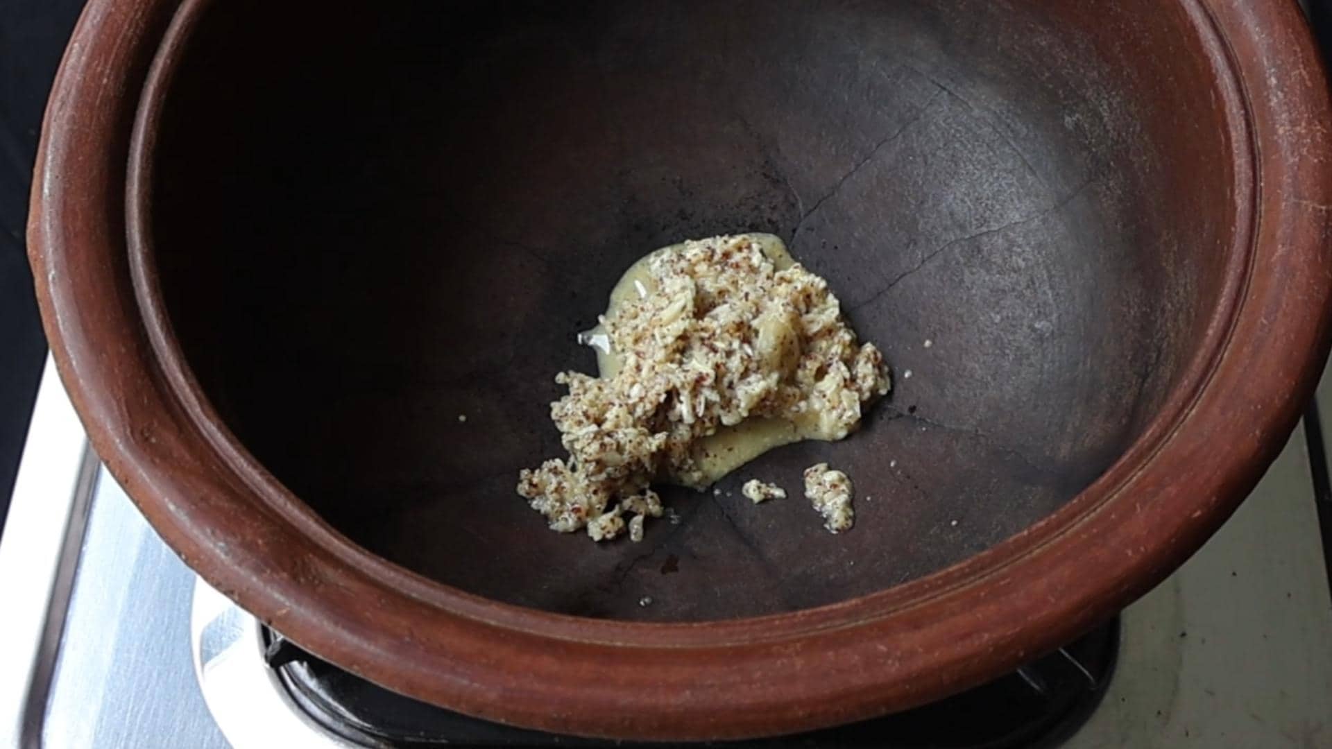 add the ginger, garlic paste in mustard, vinegar paste to cook date and lime chutney.