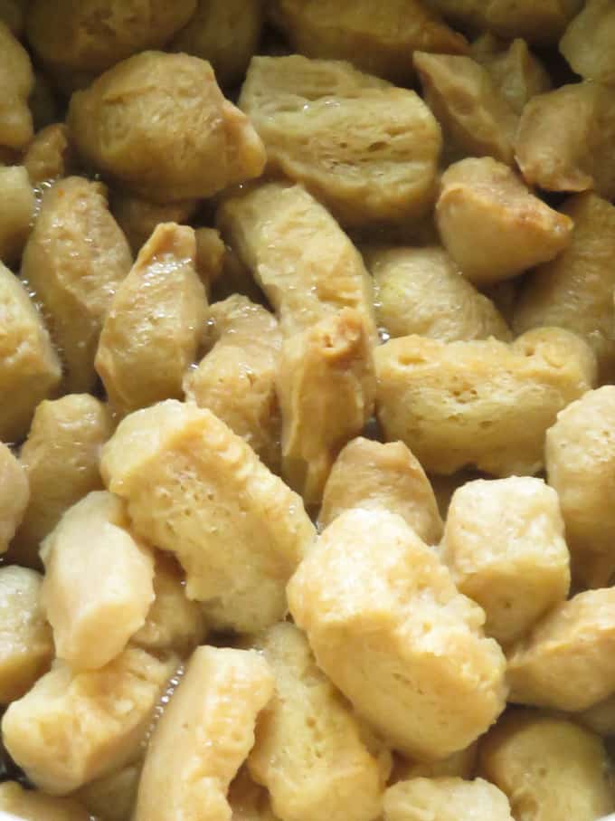 boiled soya meat in a bowl cooling.