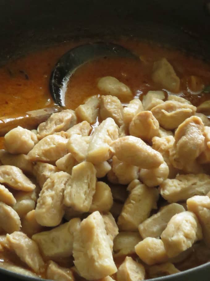 adding the boiled soya chunks to the coconut milk sauce.