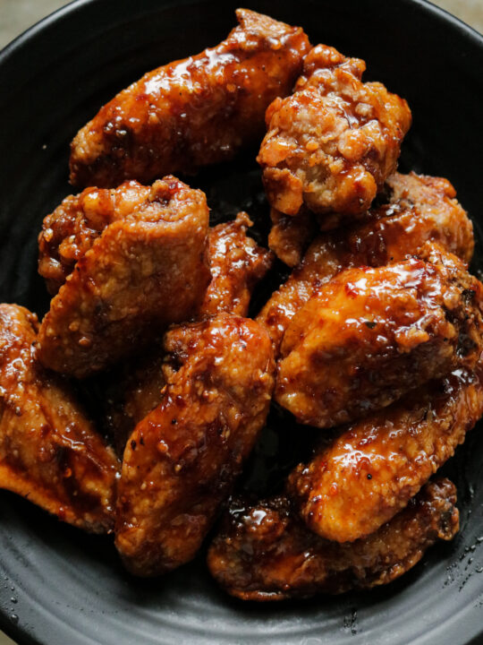 spicy pan-fried chicken wings in teriyaki sauce.- smothered in a sticky, spicy sauce. These chicken wings give new meaning to