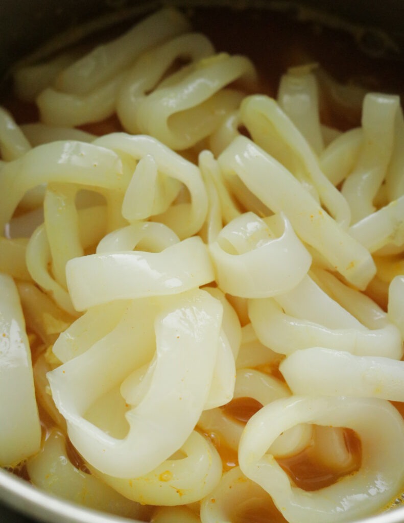cleaned calamari rings washed and ready to be cooked.