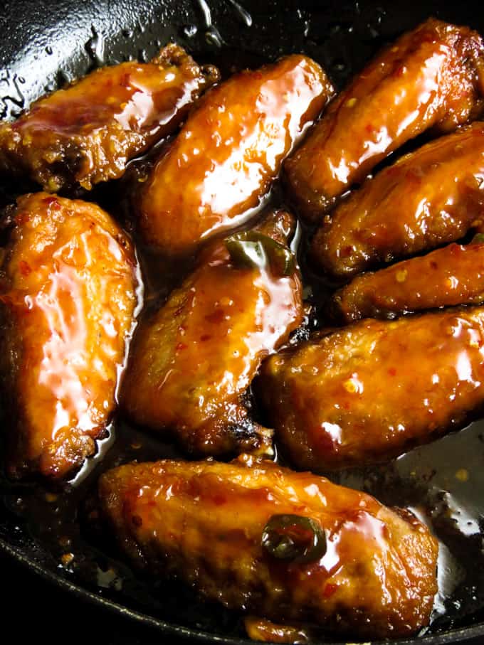 spicy pan fried chicken wings in teriyaki sauce. Island smile