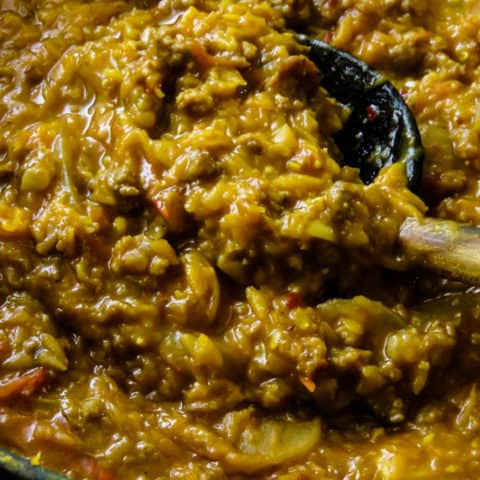 red lentil-ground beef chili. Ground meat browned with curry spices then cooked with red lentils(dhal)and coconut milk. It's a chili recipe for anyone who loves to add curry flavors to their dishes.