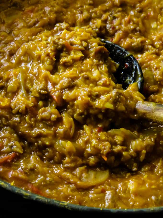 red lentil-ground beef chili. Ground meat browned with curry spices then cooked with red lentils(dhal)and coconut milk. It's a chili recipe for anyone who loves to add curry flavors to their dishes.