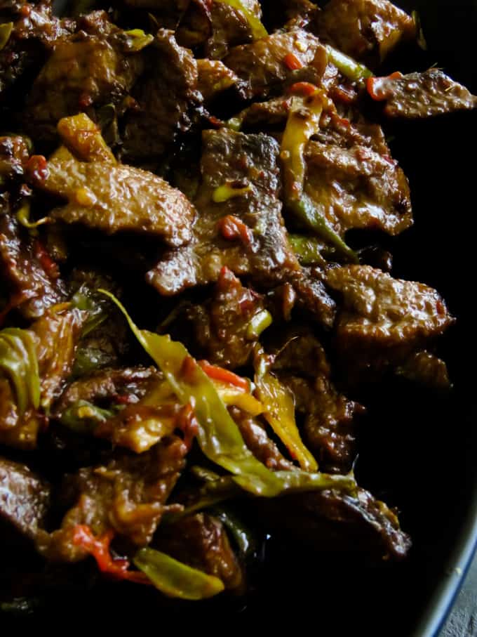 crispy beef stir fry in ginger-pepper sauce. Soy sauce marinated beef slices, fried until they turn crispy then cooked in ginger-pepper sauce to give you a tasty beef stir fry to enjoy with a bowl of rice or noodles.