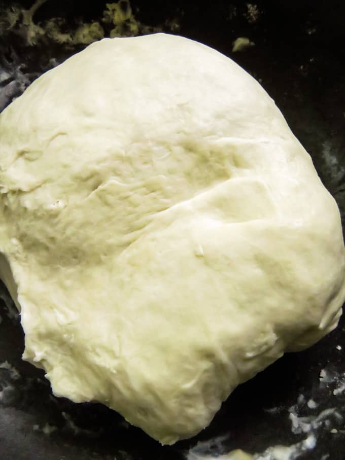 kneading smooth dough for egg roti.