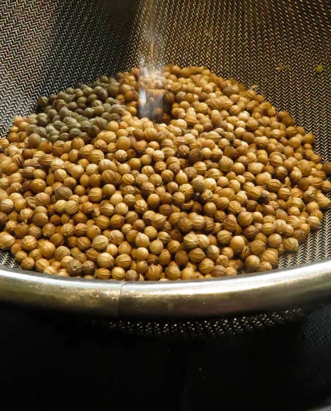 washing the coriander seeds.