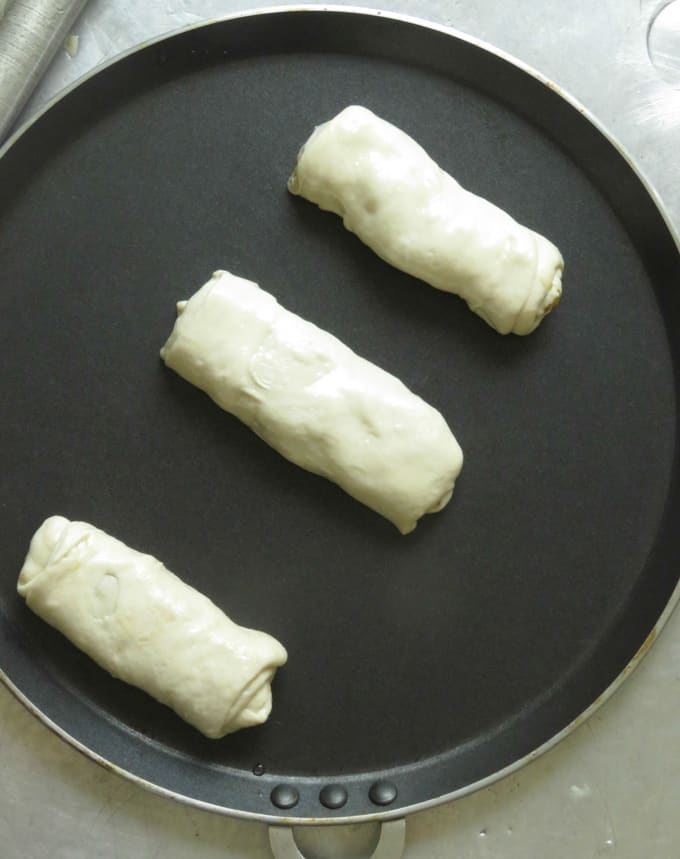 how to cook multiple vegetable rotis on top a stove top.