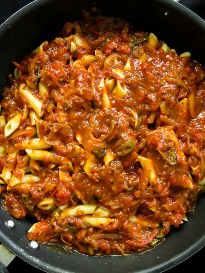 penne pasta covered in spicy tomato sauce, al arrabiata. islandmsile.org