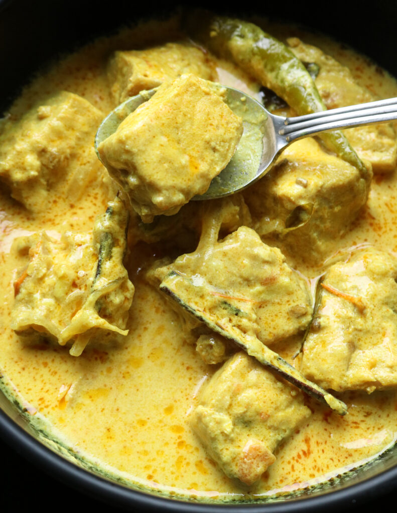 chunks of tender fish cooked in a mild creamy coconut gravy