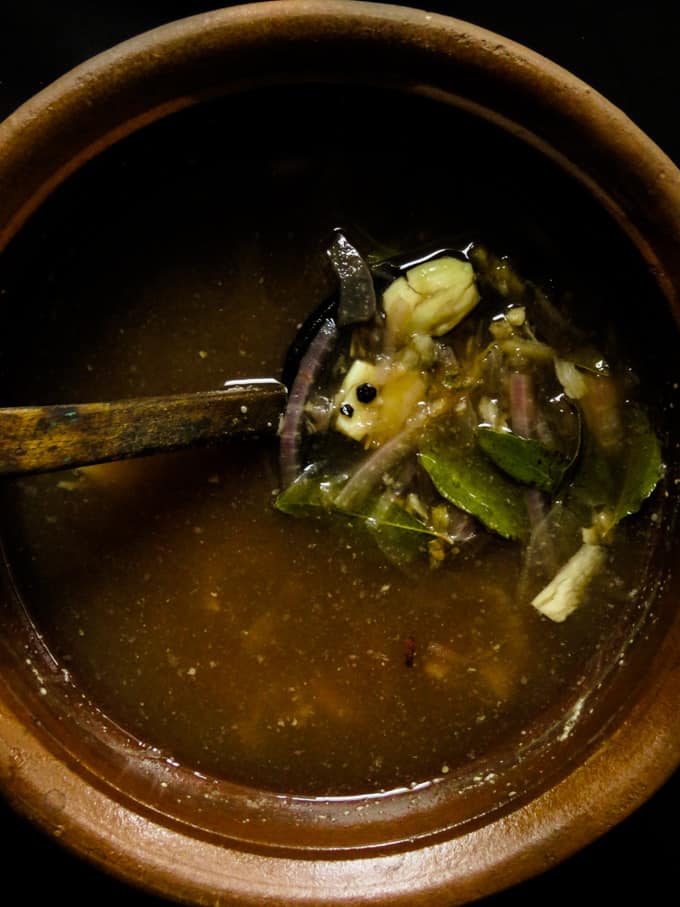 tamarind soup in a clay pot.