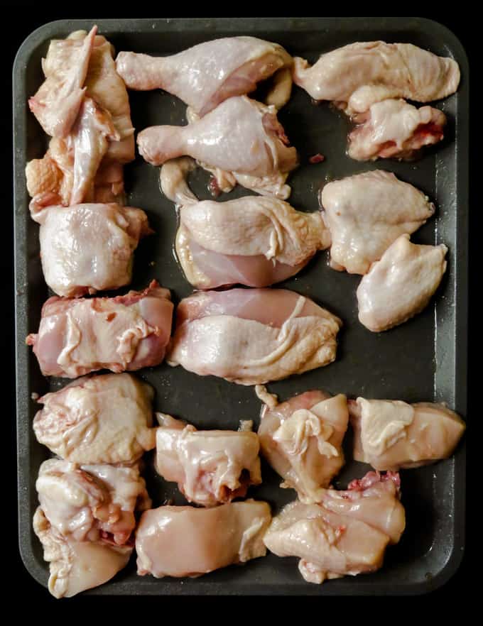 how to cut a whole chicken for grilling, baking and curries.