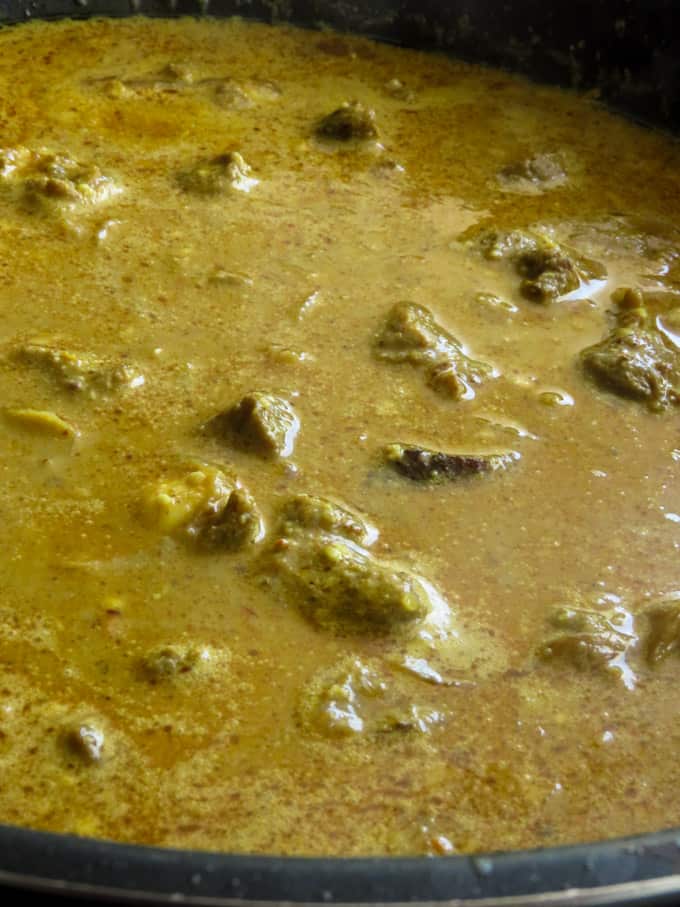slow cooking the korma curry.