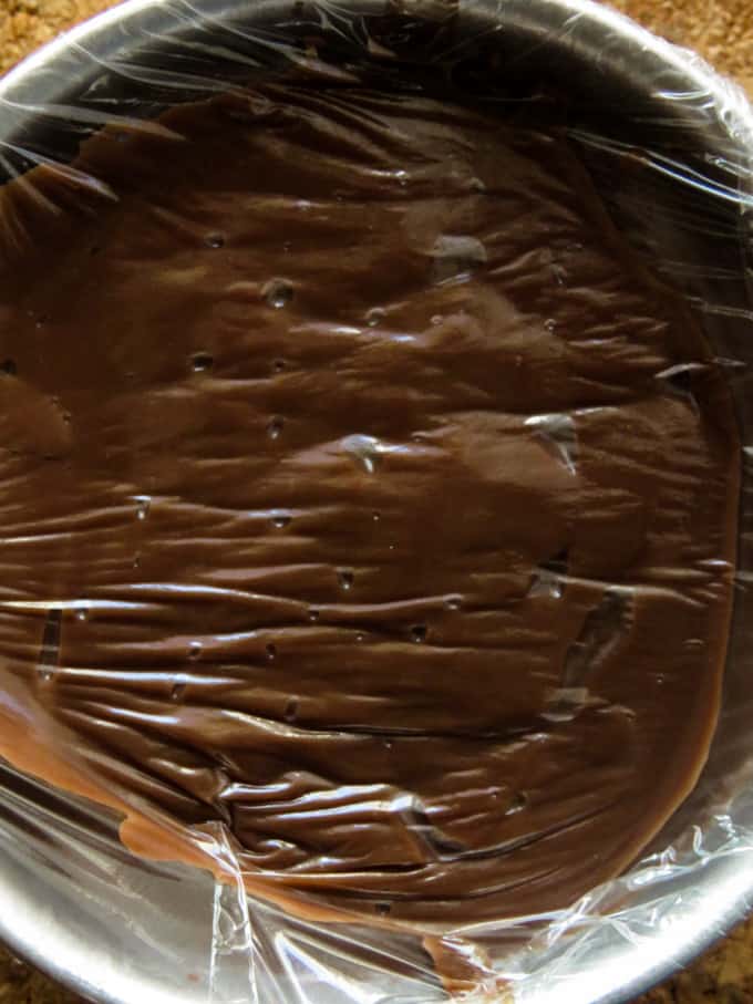 cling film on top of the chocolate pudding.