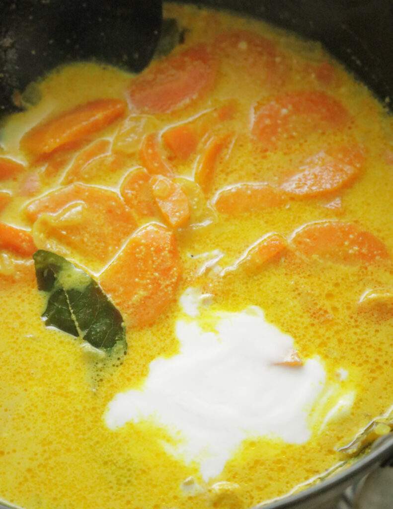 extra thick coconut milk to the cooking carrot curry