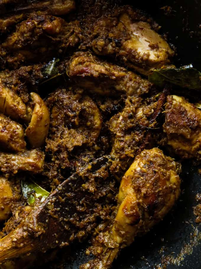 chicken rendang cooked in a pan