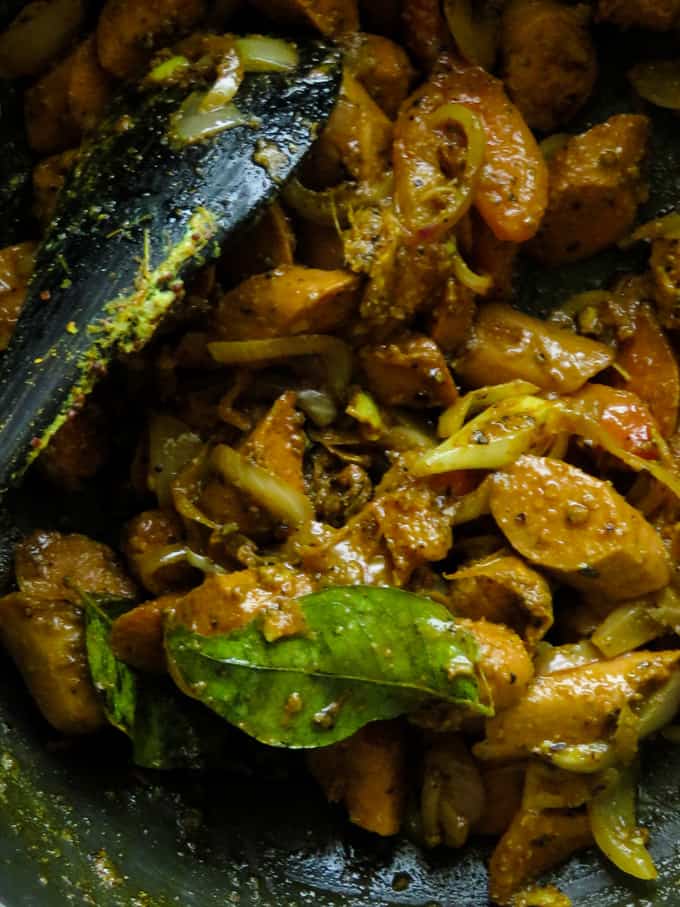 cooking the sausages for the Sri lankan curry.