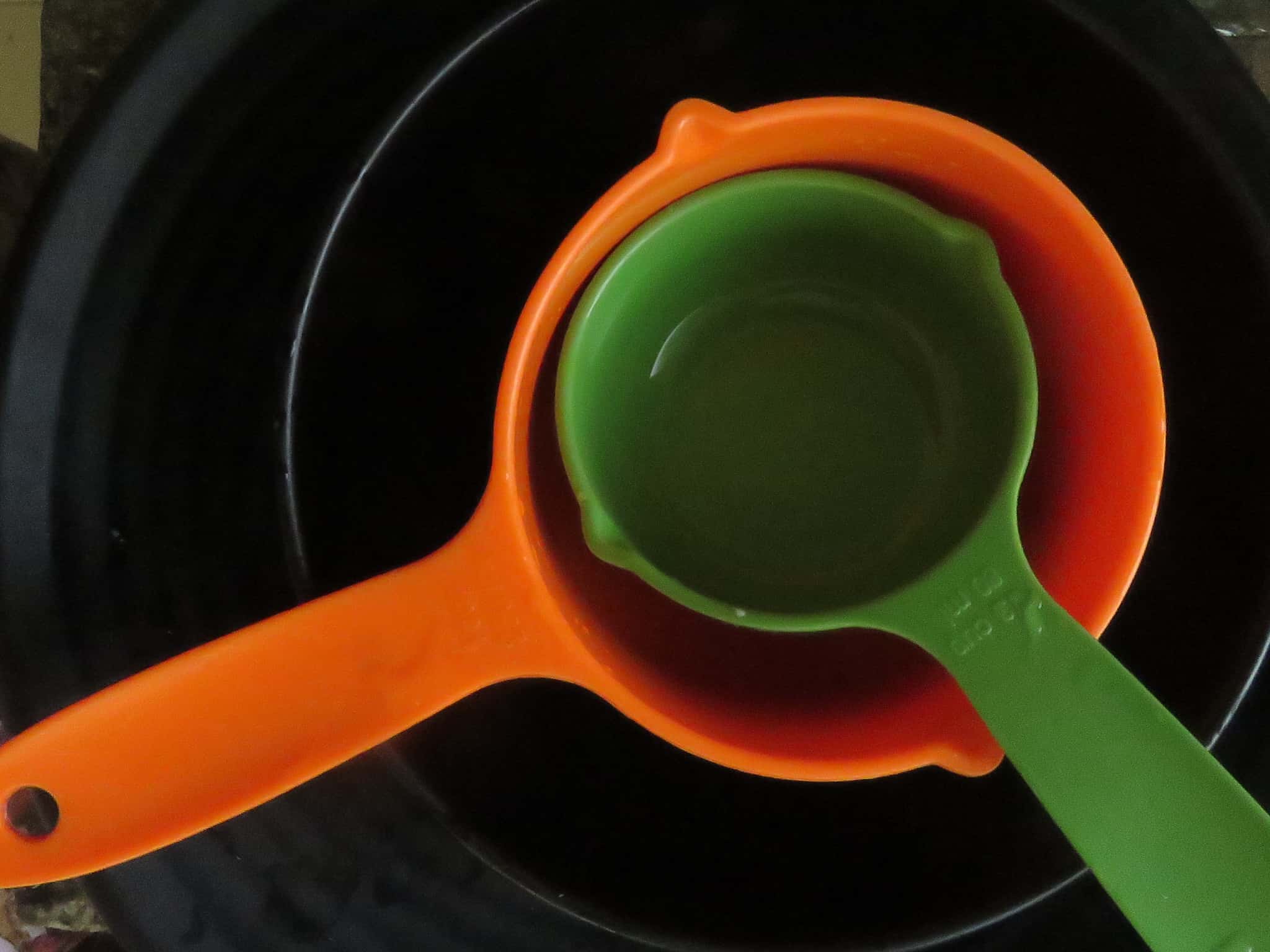 different size bowls and measuring cups to use for making pancakes. different size bowls and measuring cups to use for making pancakes.