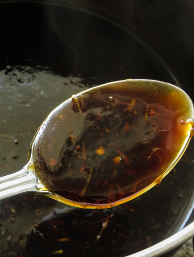 A spoon of homemade teriyaki sauce.