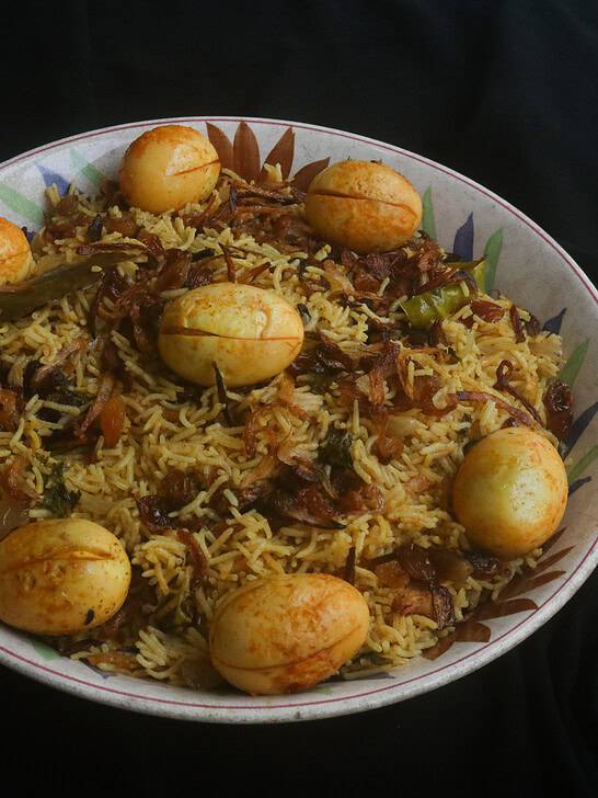 egg biryani served in a platter.