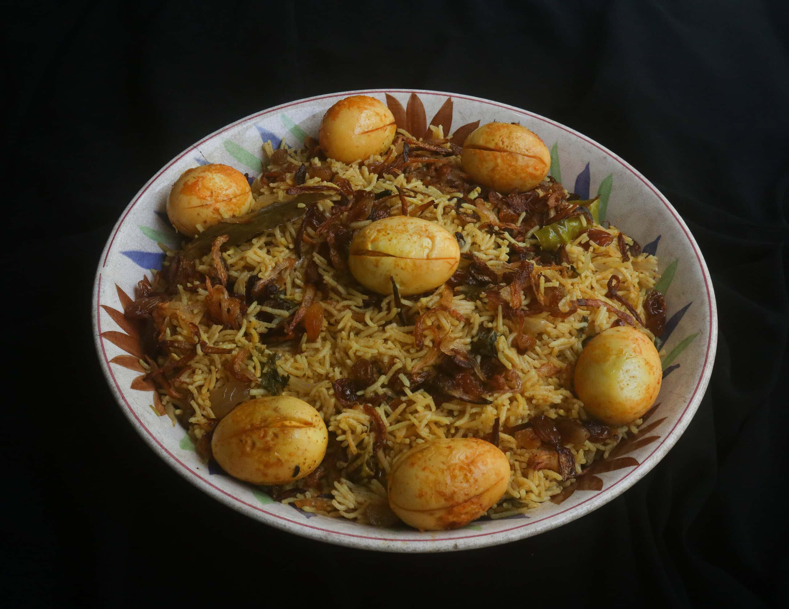 egg biryani served in a platter.