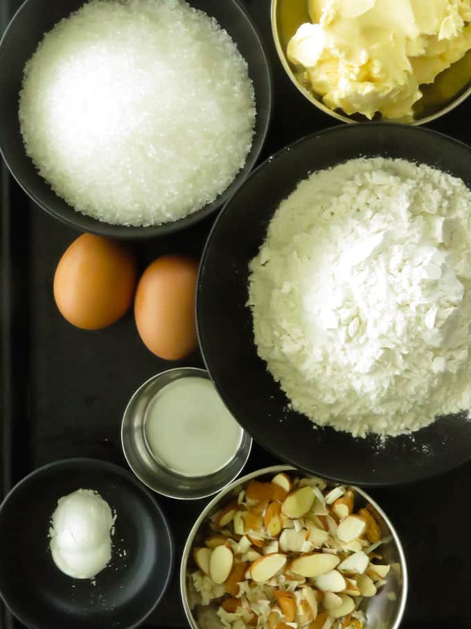 bowls of ingredients needed to make the almond butter cake.