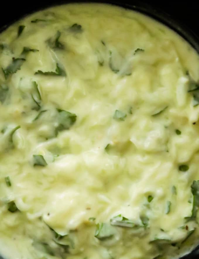 cooling cucumber raita in a bowl with coriander.