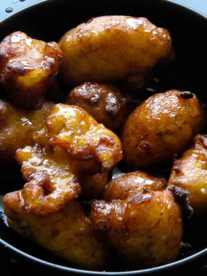 pisang goreng(mashed banana fritters in a bowl.