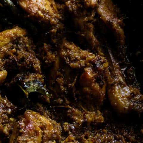 dry chicken rendang curry cooked in a wok
