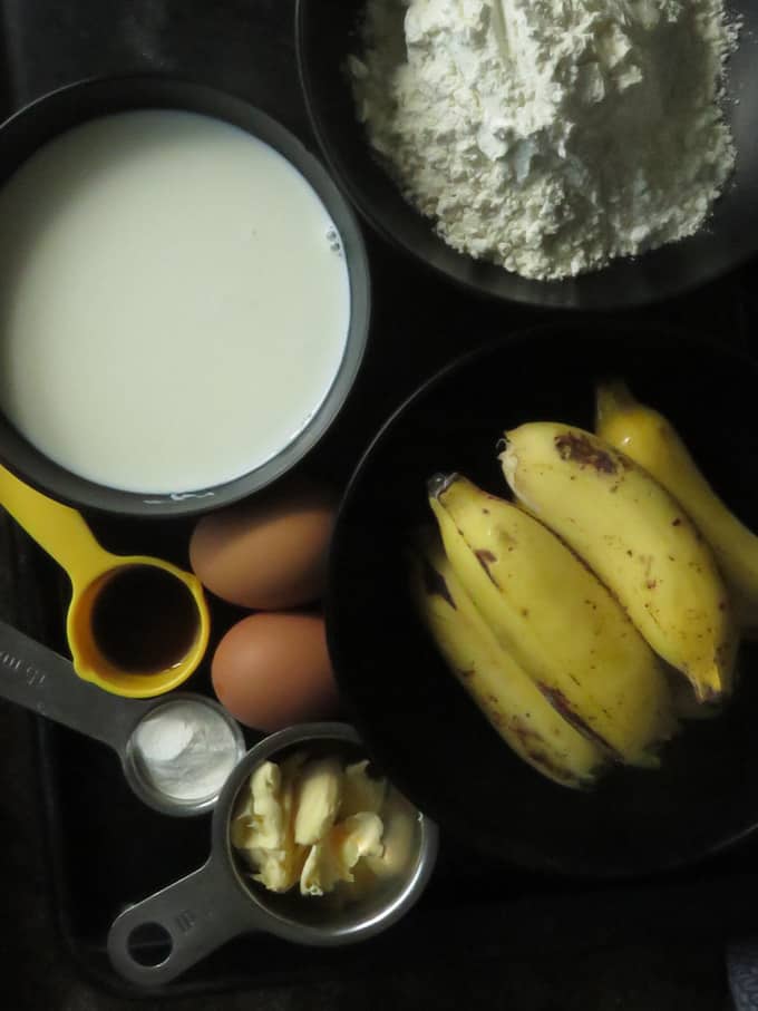 ingredients to make banana chocolate pancakes in a blender.