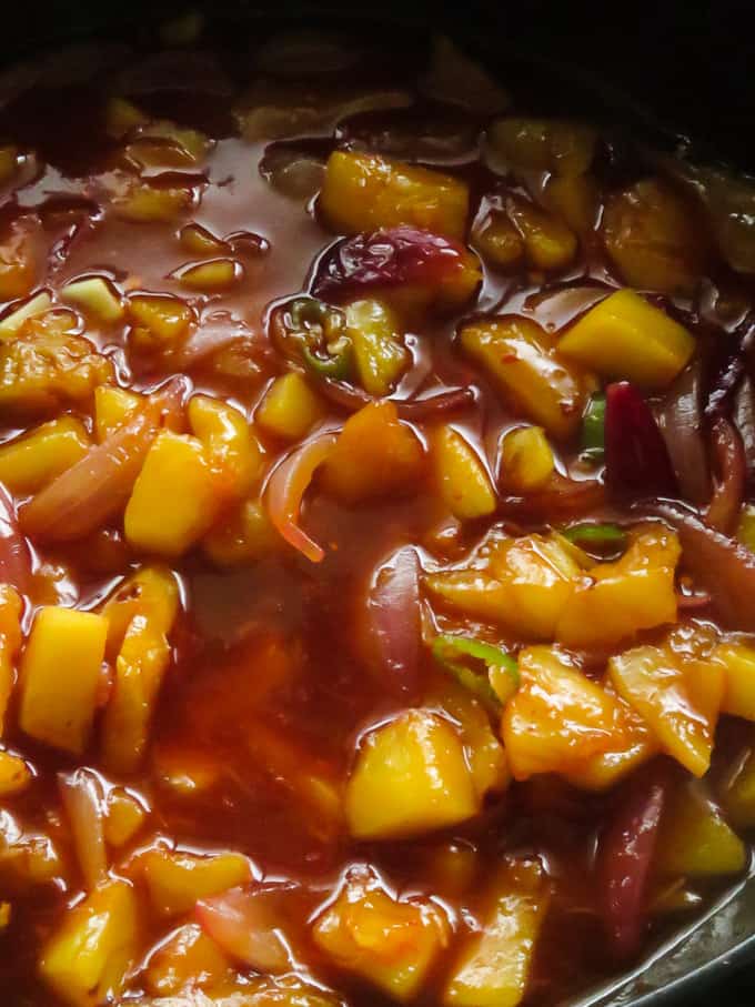 Making the sweet and sour sauce to make the sour and sweet chicken.