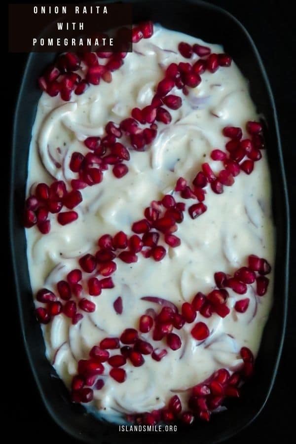 onion raita with pomegranates. this yogurt and onion side dish is always served with biryanis or pilau dishes which are usually heavy meals on their own.