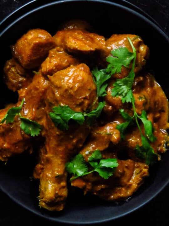 chicken mughlai curry in a bowl.