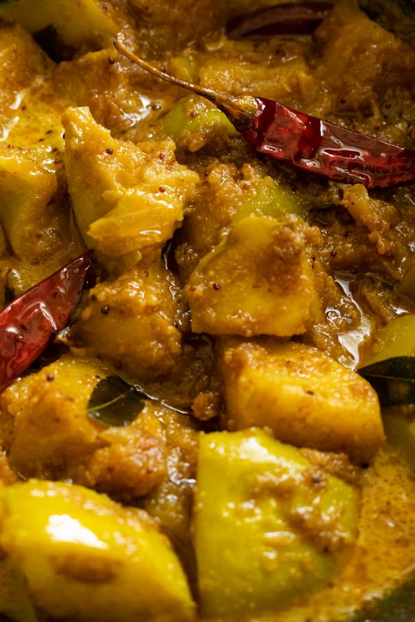 wedges of apple cooked to make a sri lankan apple curry.