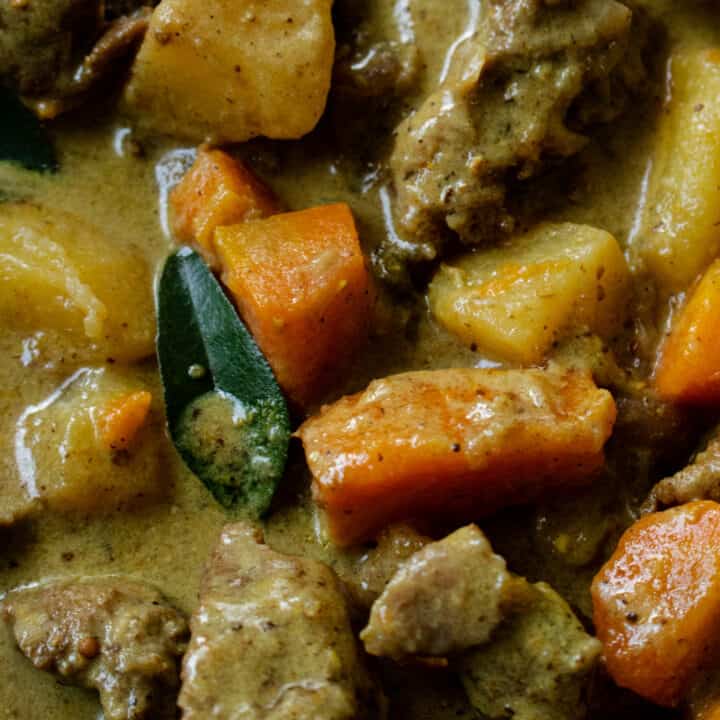 coconut beef stew with carrots and potatoes.