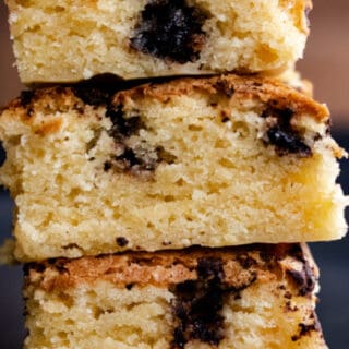 chocolate chunk blondies stacked on top of each other.