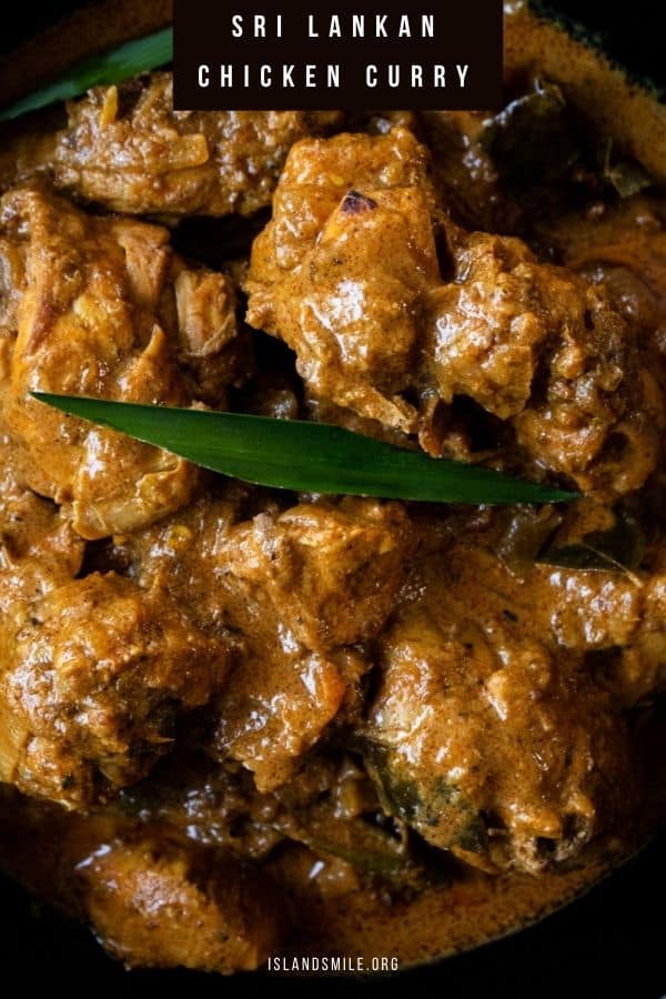 Sri lankan chicken curry with thick gravy and pandan leaves.