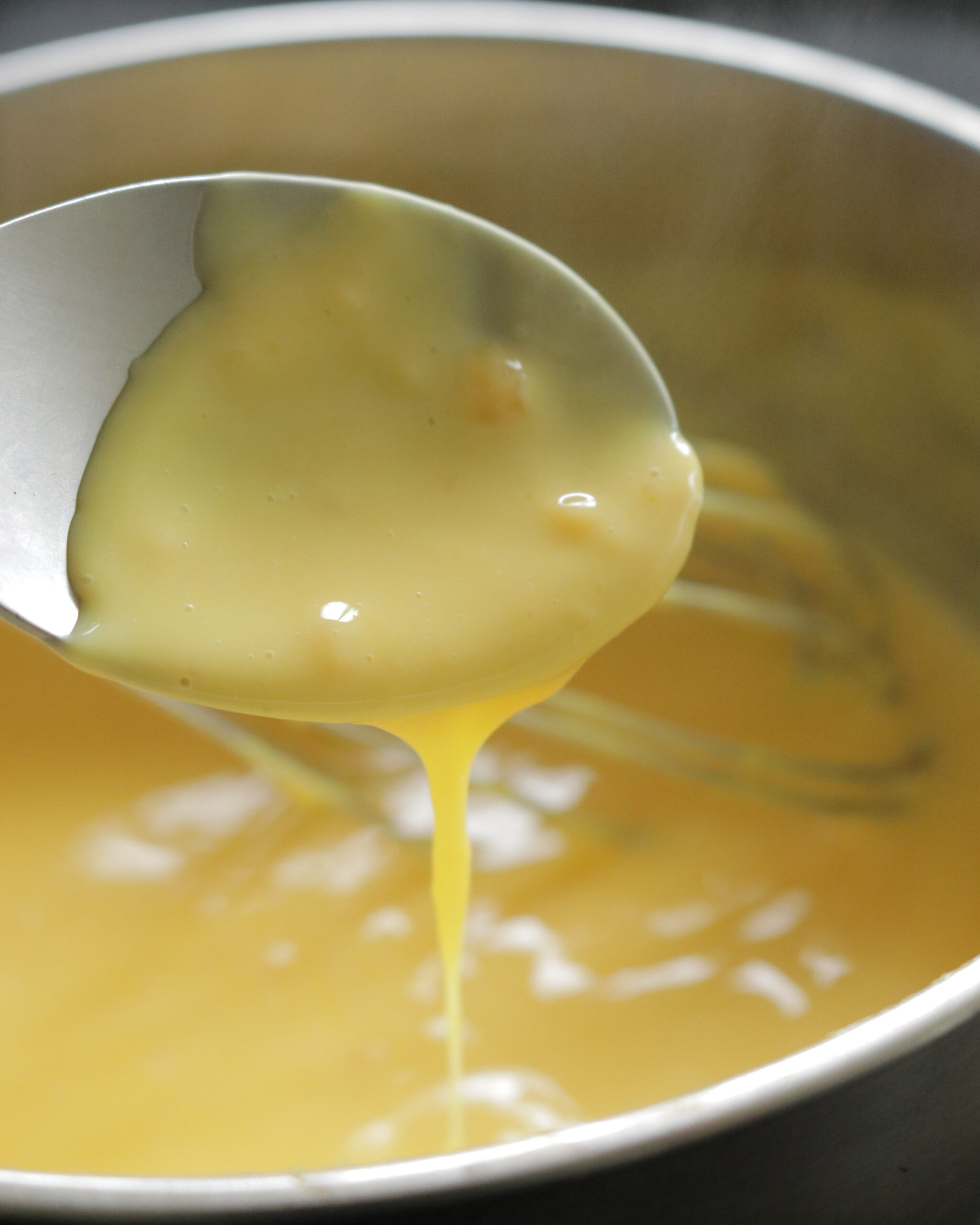 cooking the custard mix to the correct consistency to make the easy trifle.